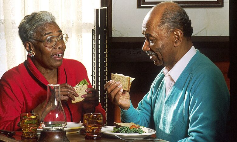 An older couple sharing a meal
